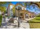 Expansive backyard featuring a built-in barbecue area and covered patio space at 9517 Spanish Steps Ln, Las Vegas, NV 89117