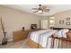 Comfortable bedroom featuring a large bed, TV, and neutral decor at 9517 Spanish Steps Ln, Las Vegas, NV 89117