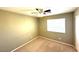 Cozy bedroom with ceiling fan and natural light at 981 Leadville Meadows Dr, Henderson, NV 89052
