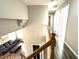 Hallway features hardwood floors, neutral paint, and access to multiple rooms at 981 Leadville Meadows Dr, Henderson, NV 89052