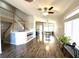 Spacious living room with a staircase and views of the kitchen at 981 Leadville Meadows Dr, Henderson, NV 89052