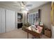 Bright room features a ceiling fan, and natural light from the shuttered windows at 11322 Corsica Mist Ave, Las Vegas, NV 89135