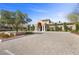 Beautiful community clubhouse with manicured landscaping and stately columns at 11322 Corsica Mist Ave, Las Vegas, NV 89135