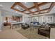 Spacious common area offers a kitchen, seating, media center, and an abundance of space for residents to enjoy at 11322 Corsica Mist Ave, Las Vegas, NV 89135