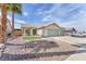 Attractive single-story home featuring desert landscaping and a three-car garage at 2151 Babylon Mill St, Henderson, NV 89002