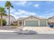 Charming single-story home with a three-car garage and desert landscaping at 2151 Babylon Mill St, Henderson, NV 89002