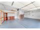 Spacious garage interior with ample storage, neutral walls, and functional layout, perfect for vehicles and projects at 2151 Babylon Mill St, Henderson, NV 89002