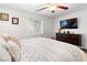 Tranquil main bedroom featuring a TV and a comfortable, well-made bed at 2213 Chandler Ranch Pl, Laughlin, NV 89029