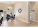 Bright dining area with natural light, chandelier, and views of the outdoor scenery at 2246 Cassatt Dr, Henderson, NV 89074