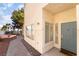 The charming front entrance features a decorative front door and walkway at 2246 Cassatt Dr, Henderson, NV 89074