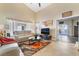 The living room has a cozy feeling and features French doors leading to the patio at 2246 Cassatt Dr, Henderson, NV 89074