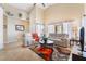 A bright and spacious living room features neutral colors, vaulted ceilings and an accent rug at 2246 Cassatt Dr, Henderson, NV 89074