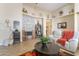 The living room features vaulted ceilings, tiled floors and a beautiful fireplace at 2246 Cassatt Dr, Henderson, NV 89074