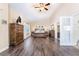 Serene main bedroom showcasing hardwood floors, high ceilings, and elegant furnishings at 2246 Cassatt Dr, Henderson, NV 89074