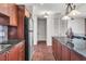 This bright kitchen features stainless steel appliances, granite counters, and ample cabinet space at 2405 W Serene Ave # 817, Las Vegas, NV 89123