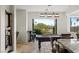 This game room has a pool table and chairs, as well as an outdoor view at 2436 Grassy Spring Pl, Las Vegas, NV 89135