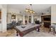 Spacious game room featuring a pool table and a wet bar with seating at 2436 Grassy Spring Pl, Las Vegas, NV 89135