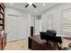This home office features white trim, shuttered windows, and a generous desk space at 2436 Grassy Spring Pl, Las Vegas, NV 89135