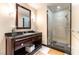Modern bathroom featuring a walk-in shower and a stylish vanity with ample counter space at 2700 Las Vegas Blvd # 910, Las Vegas, NV 89109