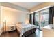 Cozy bedroom with balcony access, offering ample natural light and a relaxing atmosphere at 2700 Las Vegas Blvd # 910, Las Vegas, NV 89109