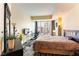 Bright bedroom with a view, a dedicated workspace, and ample natural light for a comfortable living space at 2700 Las Vegas Blvd # 910, Las Vegas, NV 89109