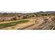 Expansive golf course views, with desert and mountain vistas beyond at 2784 Cherrydale Falls Dr, Henderson, NV 89052