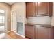 Hallway with wood flooring, built in cabinets, and a view to the bedroom at 2784 Cherrydale Falls Dr, Henderson, NV 89052