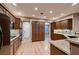 Kitchen with granite countertops, stainless steel appliances, and ample storage at 2784 Cherrydale Falls Dr, Henderson, NV 89052