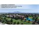 Guard-gated community with multiple pools, a golf course, activities, and scenic mountain views in the background at 2867 Geary Pl # 3008, Las Vegas, NV 89109