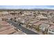 Wide aerial neighborhood shot, highlighting rooftops, solar panels, and community layout at 2945 Torreon Ln, Las Vegas, NV 89121