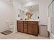Bathroom featuring a double sink vanity and a separate toilet area at 2945 Torreon Ln, Las Vegas, NV 89121
