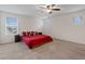 Spacious bedroom with large windows and soft, neutral carpeting at 2945 Torreon Ln, Las Vegas, NV 89121