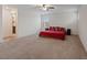 Expansive bedroom featuring neutral carpeting and ample natural light at 2945 Torreon Ln, Las Vegas, NV 89121