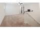 A large bonus room with neutral carpet and plenty of natural light at 2945 Torreon Ln, Las Vegas, NV 89121