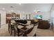 Open-concept dining area showcasing a dining table that flows into the living space at 2945 Torreon Ln, Las Vegas, NV 89121