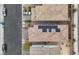 Detailed aerial of rooftop, showing tiling, solar panels, and surrounding greenery at 2945 Torreon Ln, Las Vegas, NV 89121