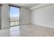 Empty bedroom with floor-to-ceiling windows showcasing mountain view at 322 Karen Ave # 2003, Las Vegas, NV 89109