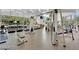 Bright gym features treadmills and weight machines and has floor-to-ceiling windows at 322 Karen Ave # 2003, Las Vegas, NV 89109