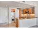 Modern kitchen with stainless steel appliances, granite countertops, and an in-unit washer/dryer at 322 Karen Ave # 2003, Las Vegas, NV 89109