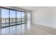 Bright, open living room with marble floors and floor-to-ceiling windows offering panoramic city views at 322 Karen Ave # 2003, Las Vegas, NV 89109