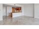 Open-concept living area with modern kitchen and marble floors, perfect for entertaining and relaxation at 322 Karen Ave # 2003, Las Vegas, NV 89109
