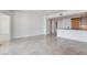 Spacious living room with a modern kitchen featuring stainless appliances and marble floors throughout at 322 Karen Ave # 2003, Las Vegas, NV 89109
