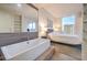 Modern bathroom with a soaking tub, neutral decor and large window at 3722 Las Vegas Blvd # 1204, Las Vegas, NV 89158