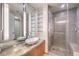 Modern bathroom vanity with an oval sink and a glass-enclosed shower at 3722 Las Vegas Blvd # 1204, Las Vegas, NV 89158