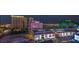 Las Vegas city view at twilight with Polo Towers and other brightly lit commercial properties at 3722 Las Vegas Blvd # 1204, Las Vegas, NV 89158