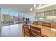 Modern kitchen with a view of the Las Vegas skyline, stainless steel appliances, and casual dining at 3722 Las Vegas Blvd # 1204, Las Vegas, NV 89158