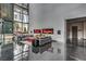 Modern lobby featuring stylish seating, artwork, and floor-to-ceiling windows at 3722 Las Vegas Blvd # 1204, Las Vegas, NV 89158