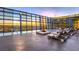 Luxury rooftop pool with lounge chairs and stunning city views at sunset at 3722 Las Vegas Blvd # 1204, Las Vegas, NV 89158