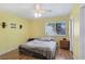 Bright bedroom with ceiling fan, and decor, and furniture at 3747 N Braewood South Ave, Las Vegas, NV 89120
