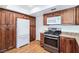 Updated kitchen with stainless steel oven, microwave, and modern cabinetry at 3747 N Braewood South Ave, Las Vegas, NV 89120